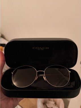 Coach Women's Round Sunglasses in Black and Gold Tones